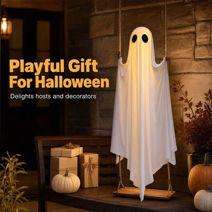 Close-up of glowing white fabric hanging ghost Halloween swing decoration
